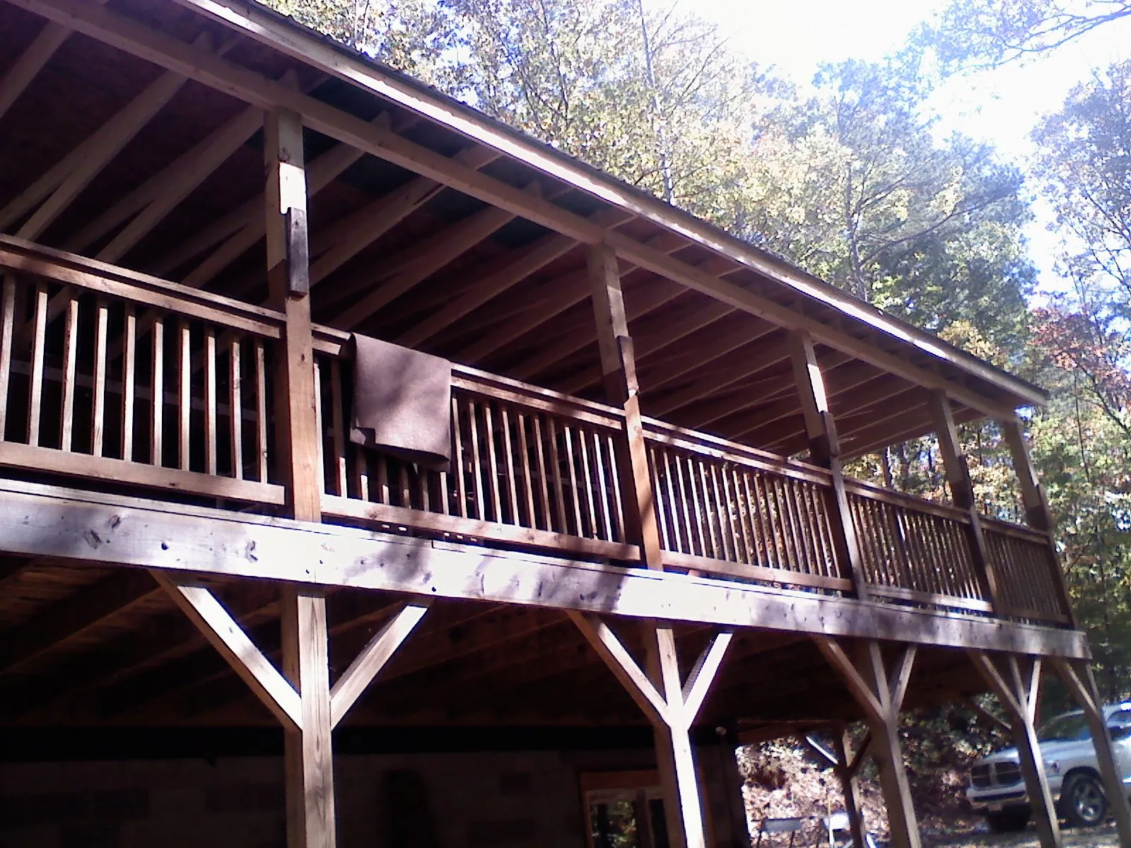Timber framing under a new elevated porch and deck — Roof Leak Repair in East Orleans by Roofing Brothers